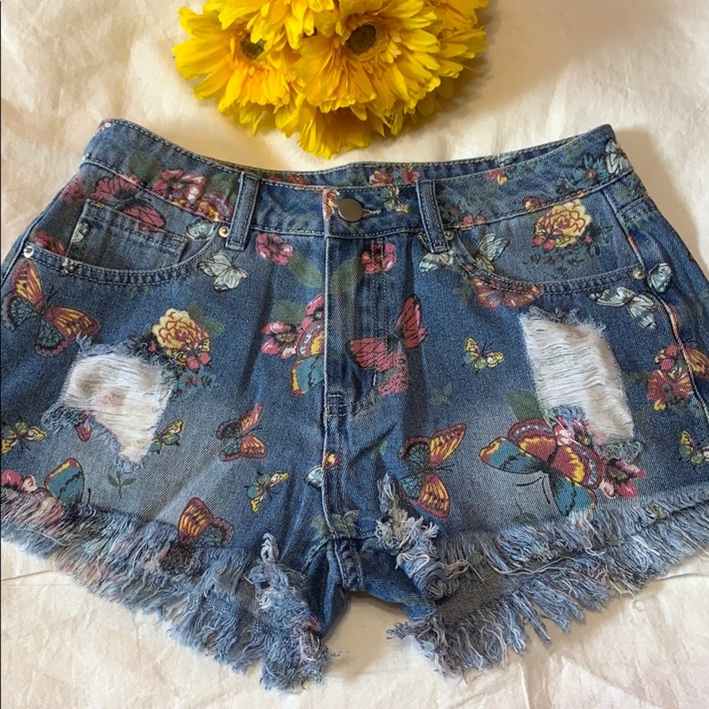 BLUE RIPPED BUTTERFLY DENIM SHORTS WITH RAW HEM - Picture 6 of 10